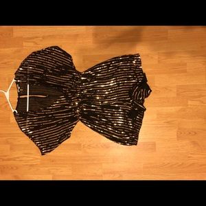 Shiny black and gold romper